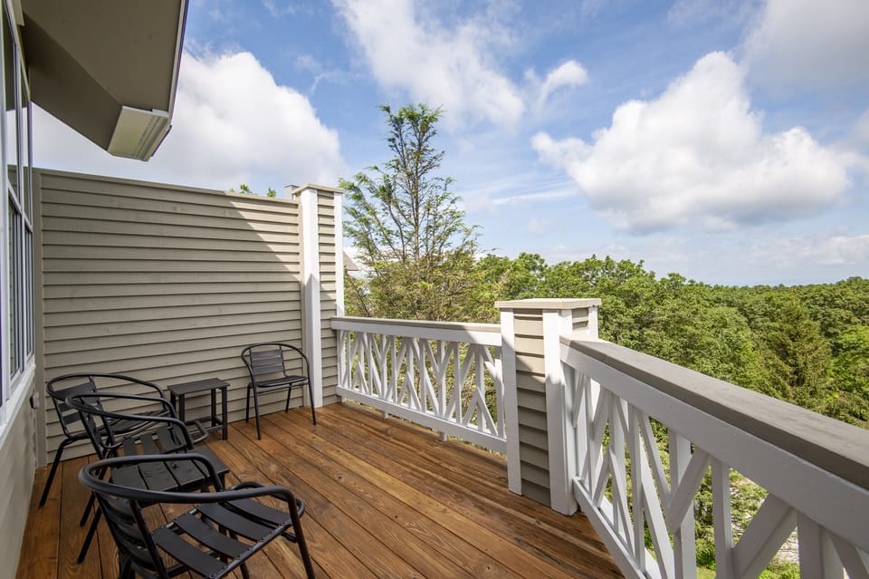 Enjoy morning coffee or evening cocktails on the deck overlooking the valley.