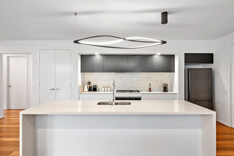 Spacious kitchen with large island bench