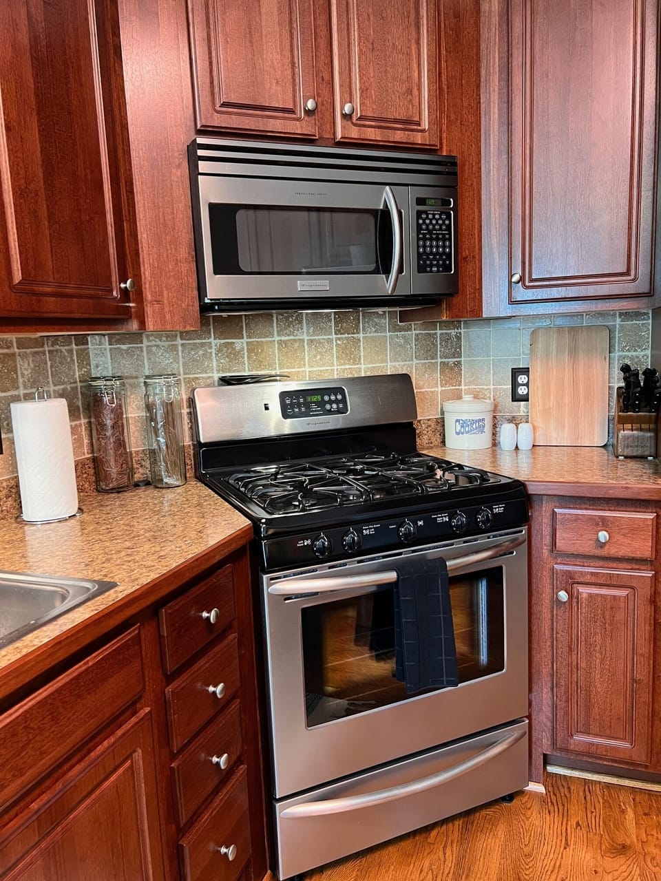 Gas cooking.  Microwave includes externally vented exhaust fan.