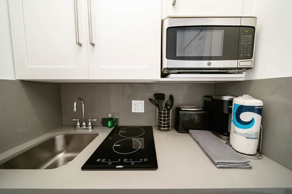 Our kitchen, though small in size, is mighty in possibilities, perfect for culinary experiments or quick bites.