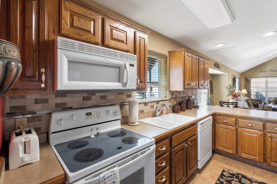 Townhome, Multiple Beds, Balcony (The Hogue Penthouse) | Private kitchen | Coffee/tea maker