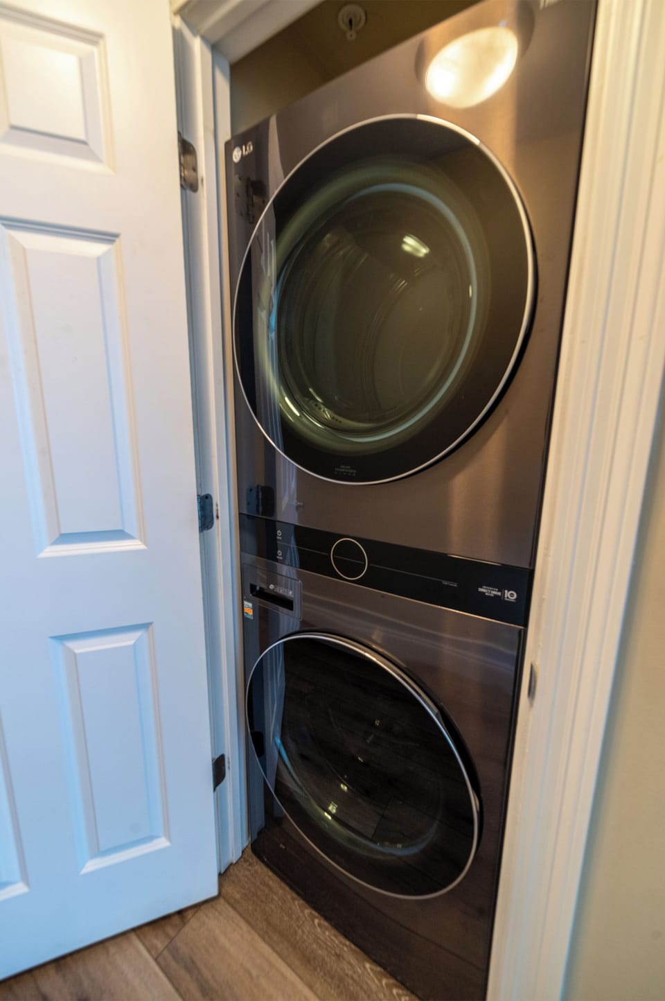 Full size stackable washer & dryer inside the condo