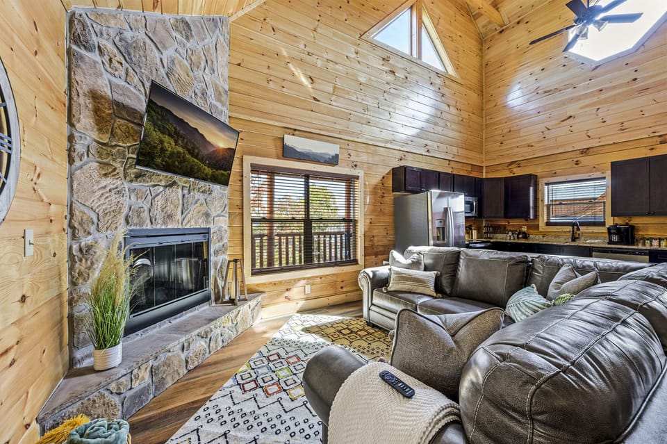 Living room {Relax in Leather Sectional while food  is being prepared};
