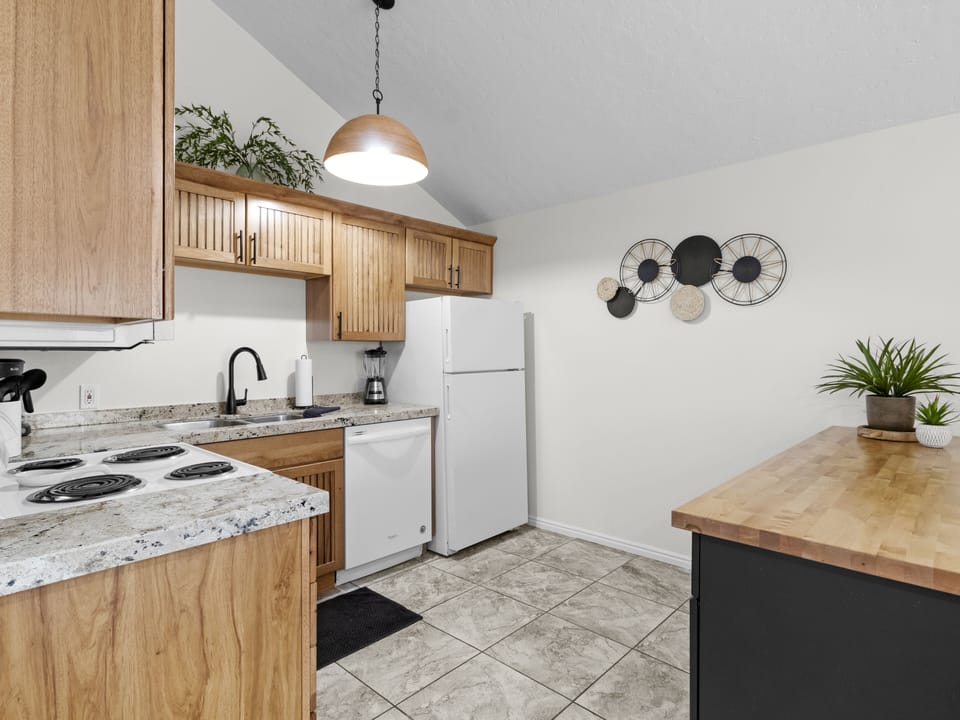 Fully stocked kitchen with fridge