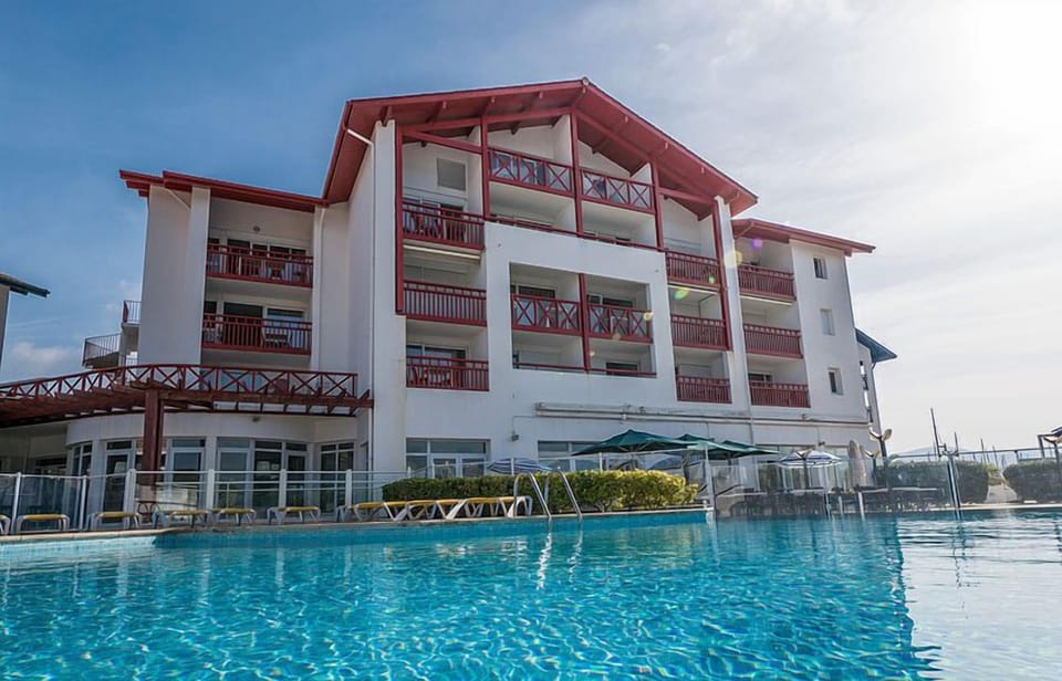 Relax and unwind in the sparkling outdoor swimming pool.
