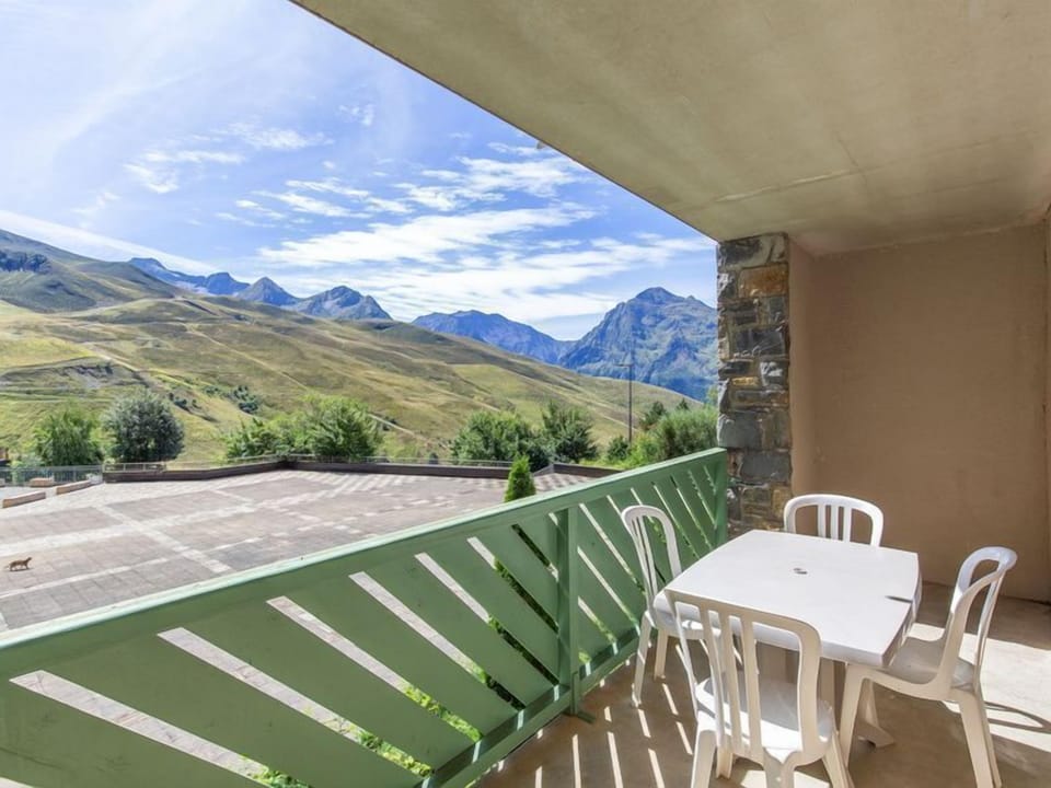 Enjoy breathtaking mountain views from the cozy balcony of this 1-bedroom apartment.