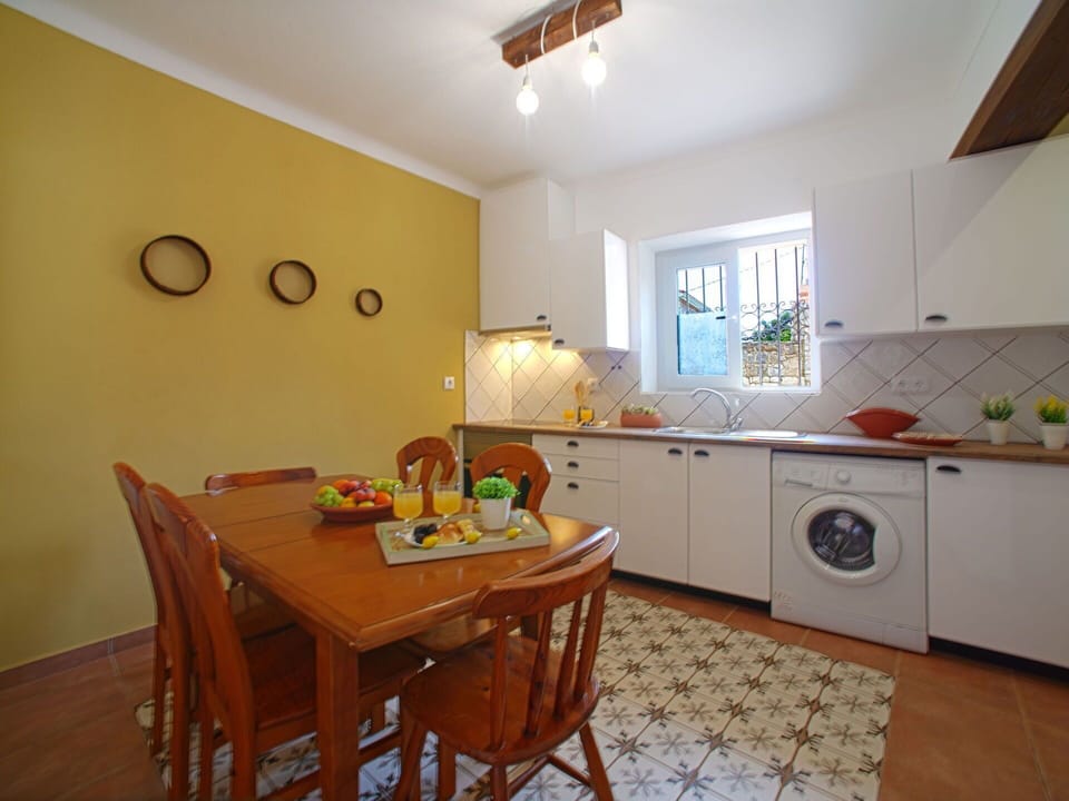 Cabinetry, Property, Furniture, Table, Wood, Orange, Interior Design, Lighting, Chair, Yellow