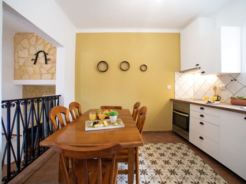 Furniture, Property, Cabinetry, Table, Wood, Interior Design, Yellow, Chair, Floor, Drawer