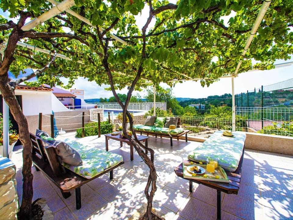 Water, Sky, Plant, Cloud, Swimming Pool, Outdoor Furniture, Shade, Tree, Leisure, Rectangle
