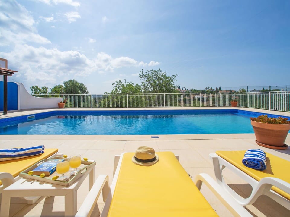 Water, Sky, Plant, Cloud, Swimming Pool, Outdoor Furniture, Shade, Tree, Leisure, Rectangle