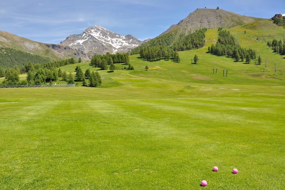Wide meadows and golf course around Sestriere