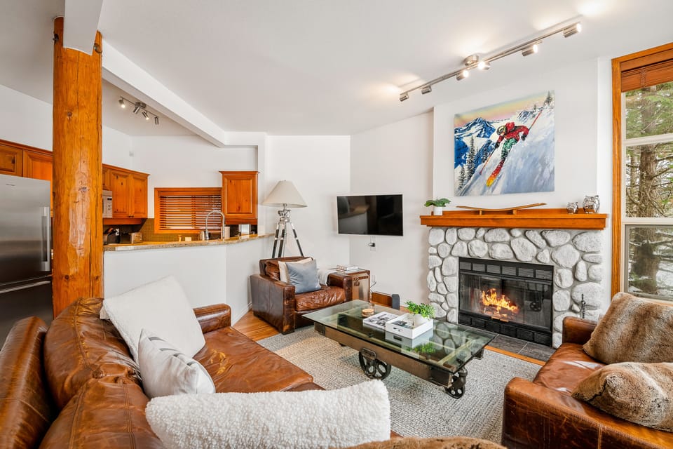11 ft high ceilings and wood burn fire place!