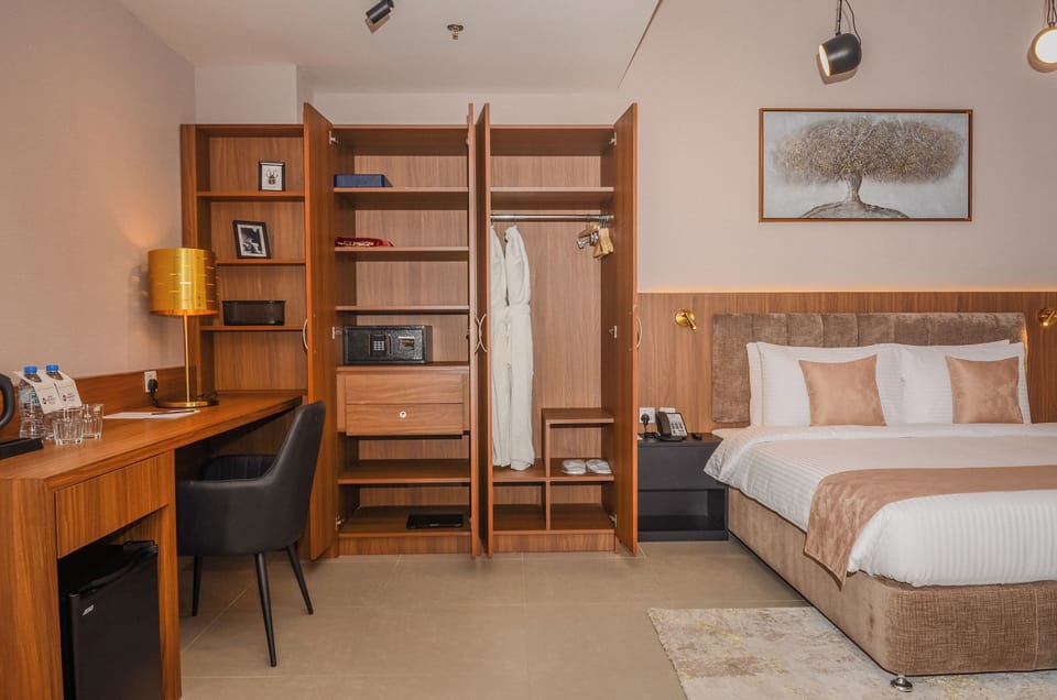Premium Room, 1 King Bed, Non Smoking (Living Room;with Sofabed) | Egyptian cotton sheets, premium bedding, pillowtop beds, minibar