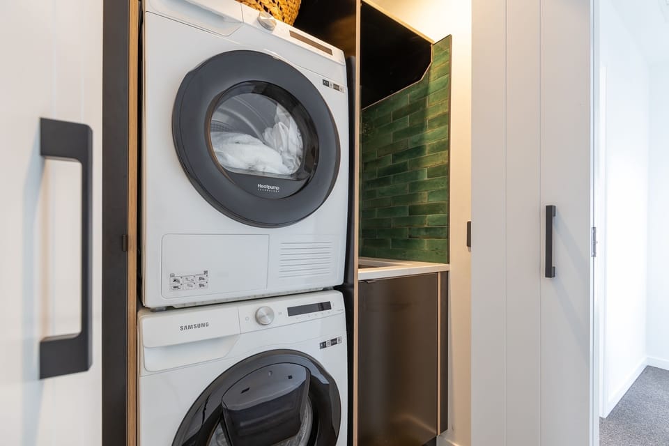 Fully equiped laundry, including an eco heat pump dryer.