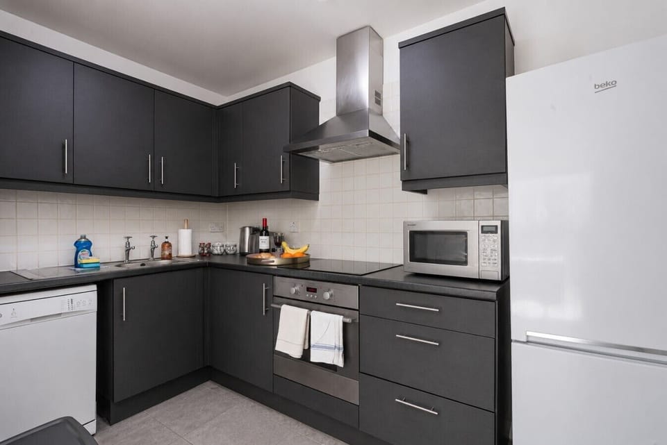 A fully equipped kitchen with everything you need to prepare a home cooked meal.