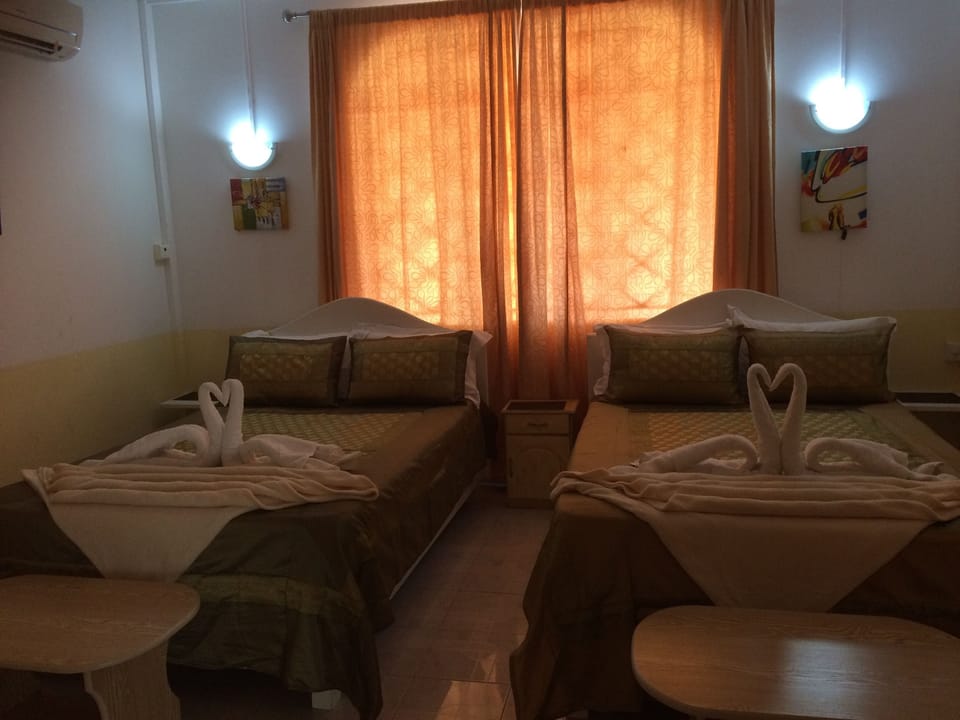 Family Room | In-room safe, iron/ironing board, WiFi (free)