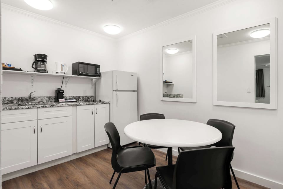 Suite, 2 Queen Beds, Non Smoking, Kitchenette | Laptop workspace, iron/ironing board, cribs (surcharge), WiFi (free)