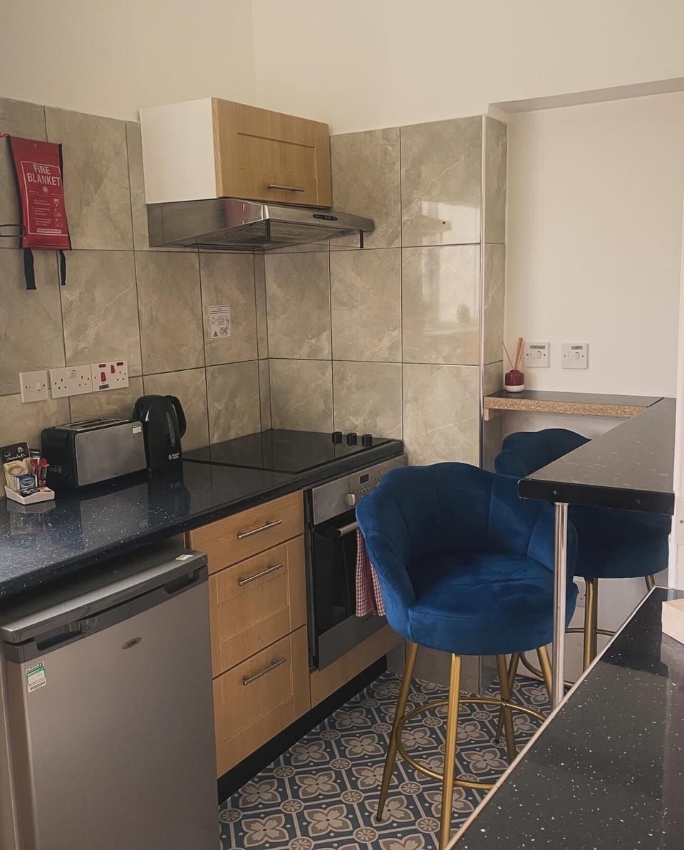Triple Studio | Private kitchen | Fridge, electric kettle
