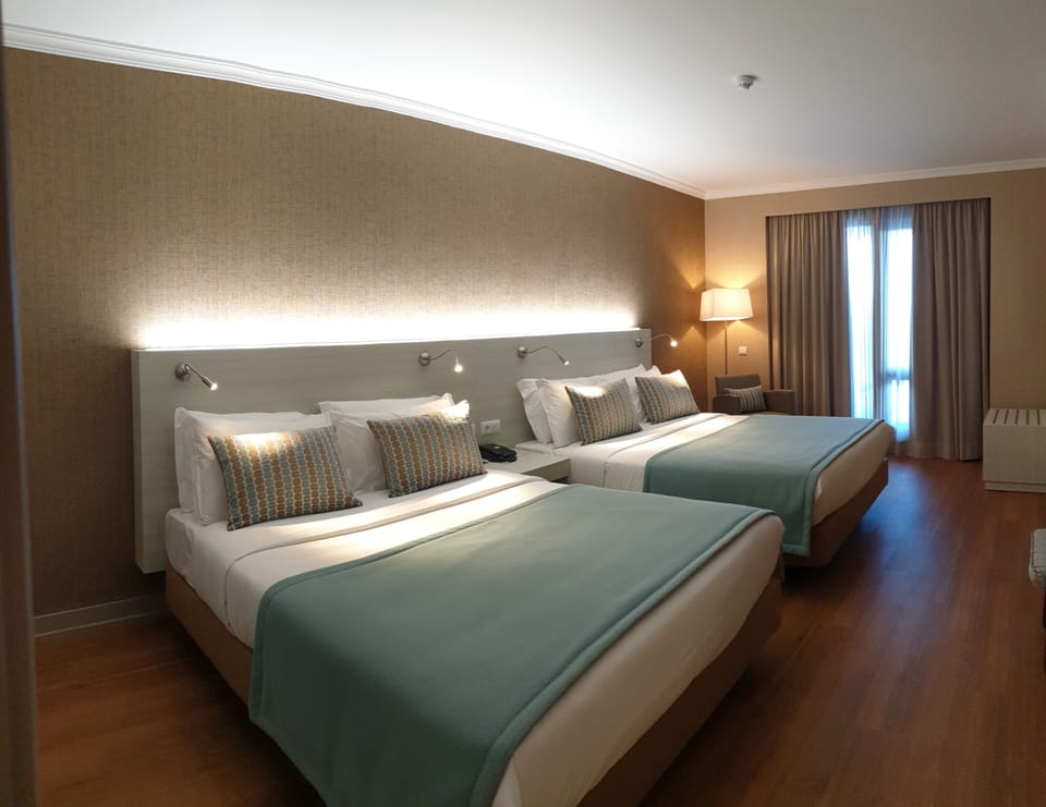 Family Suite | Free minibar, in-room safe, desk, blackout drapes