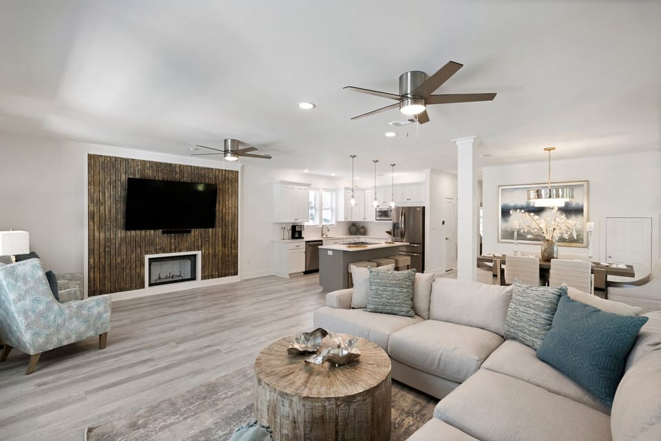 Open living, kitchen, and dining space