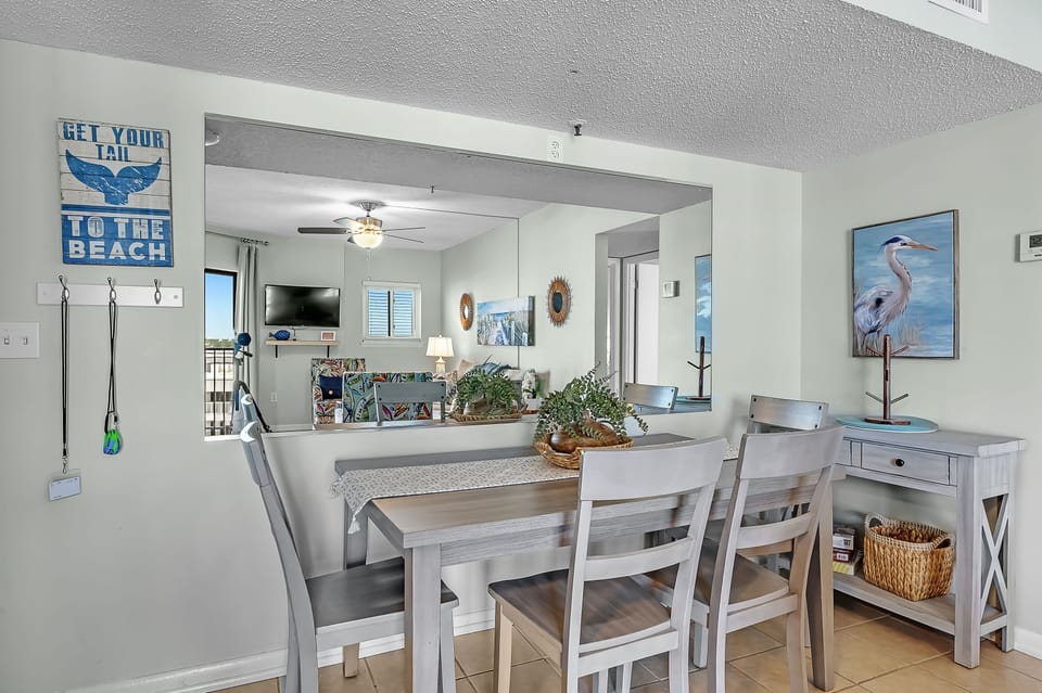 Dining Area with Table and 4 Chairs plus Bar and Stools