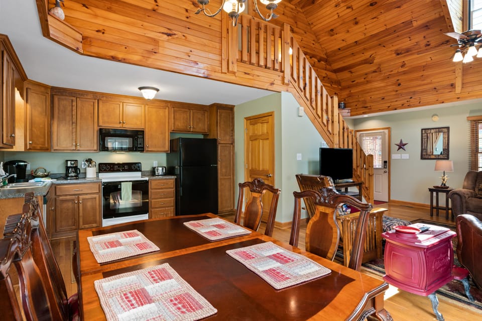 Dining area open to the kitchen and the living room. 