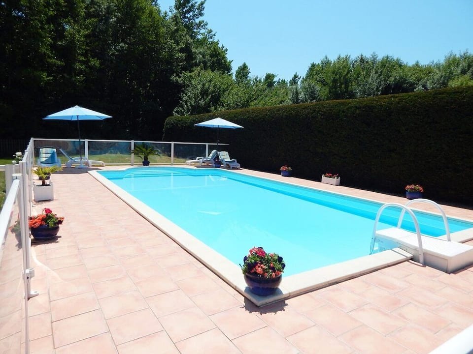 Shared pool between both Gites.  Safety gate and fenced off
