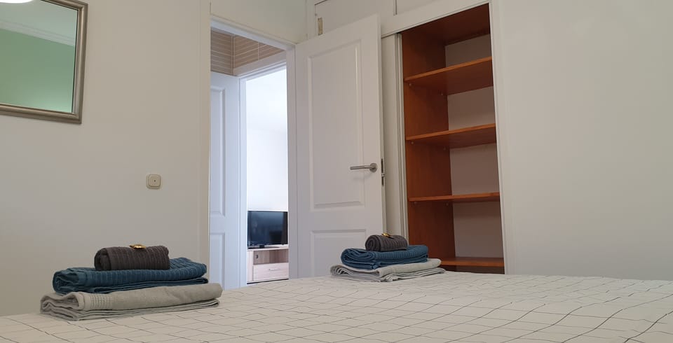 Well-thought-out storage in this pretty bedroom.