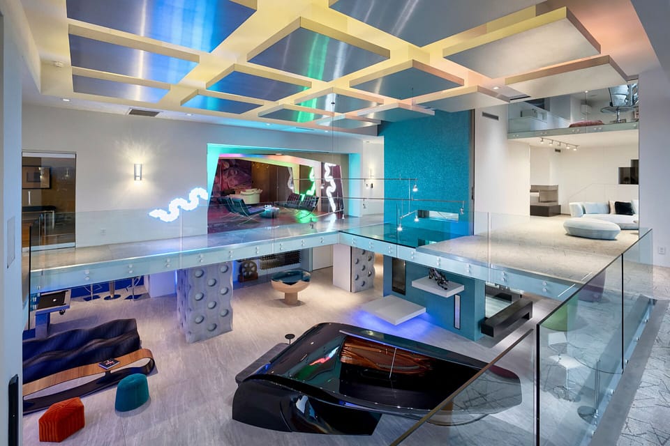 Additional loft views of grand piano & first floor & elevator