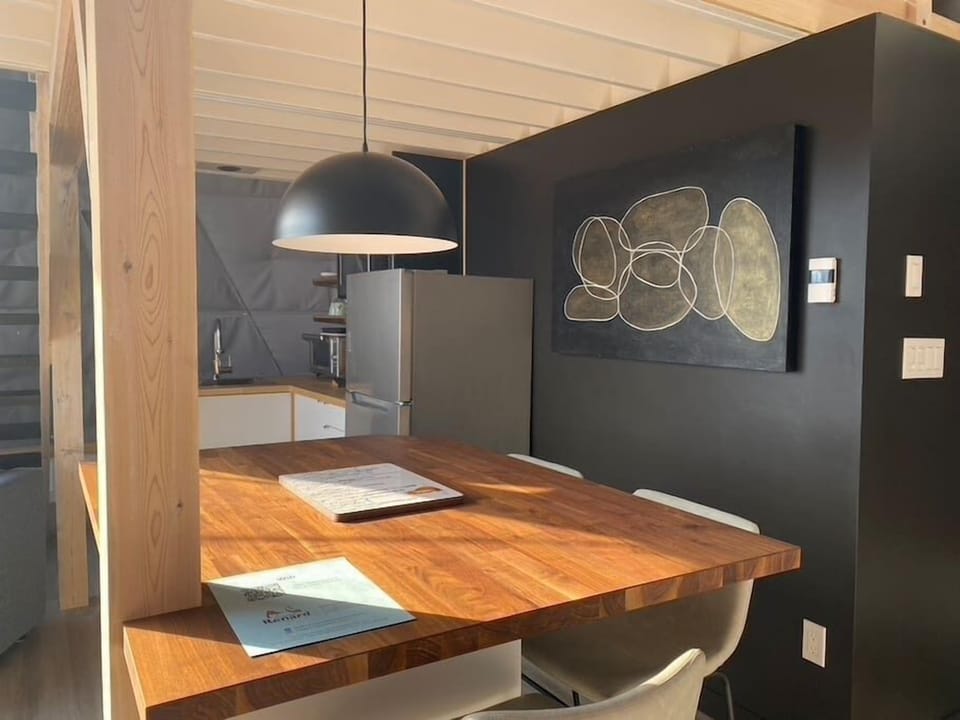 The kitchen island and small full kitchen offer all the amenities for your meals with a view!