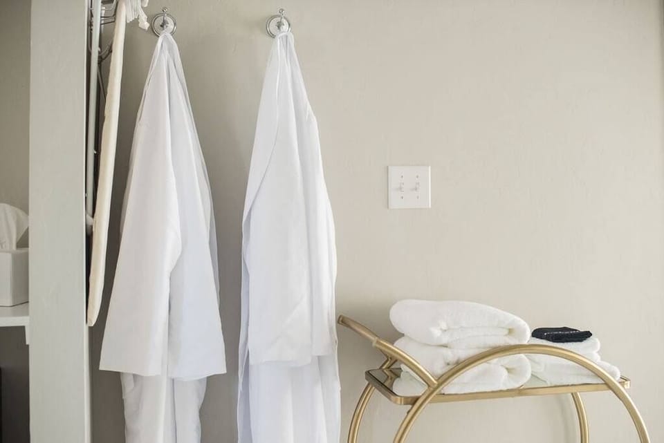 Spa robes, plush towels and soaps provided