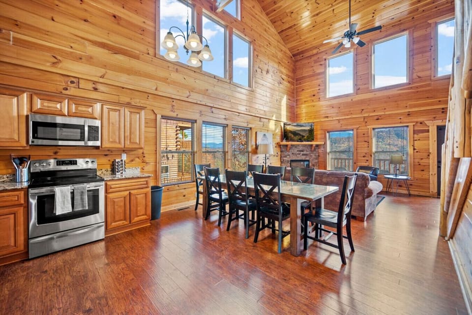 Open floor plan with kitchen, dining area and living area all on the main entry level.