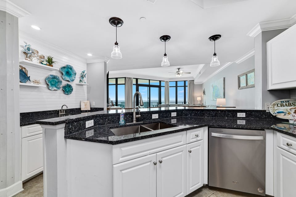 Bright and airy kitchen with ample counter space and modern amenities, creating an inviting space for cooking and gathering.