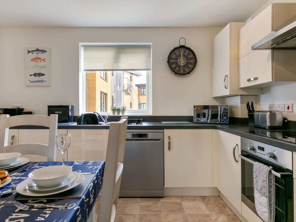 Property, Cabinetry, Furniture, Countertop, Kitchen Sink, Blue, Kitchen Stove, Kitchen Appliance, Sink, Kitchen
