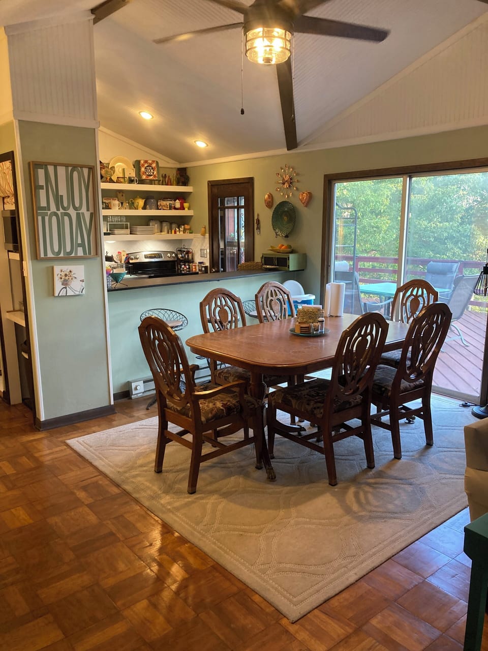 Bonus seating at bar and table for 2 adjacent to dining table. 