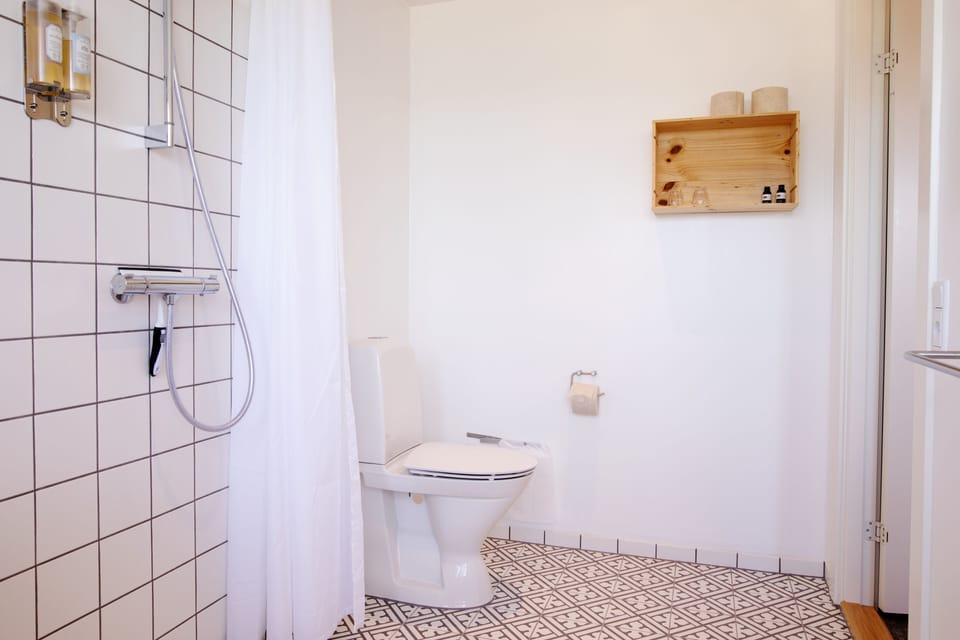 Shower, hair dryer, slippers, heated floors
