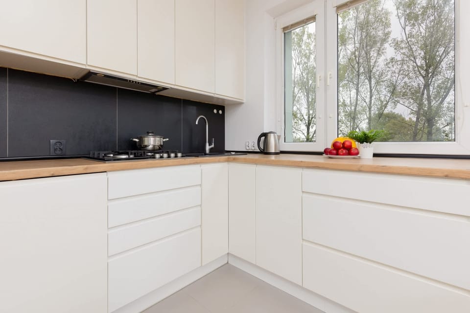 A detailed view of the kitchen, showcasing its modern design and thoughtful layout.