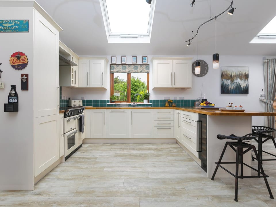 Fridge, dishwasher, electric kettle, cookware/dishes/utensils