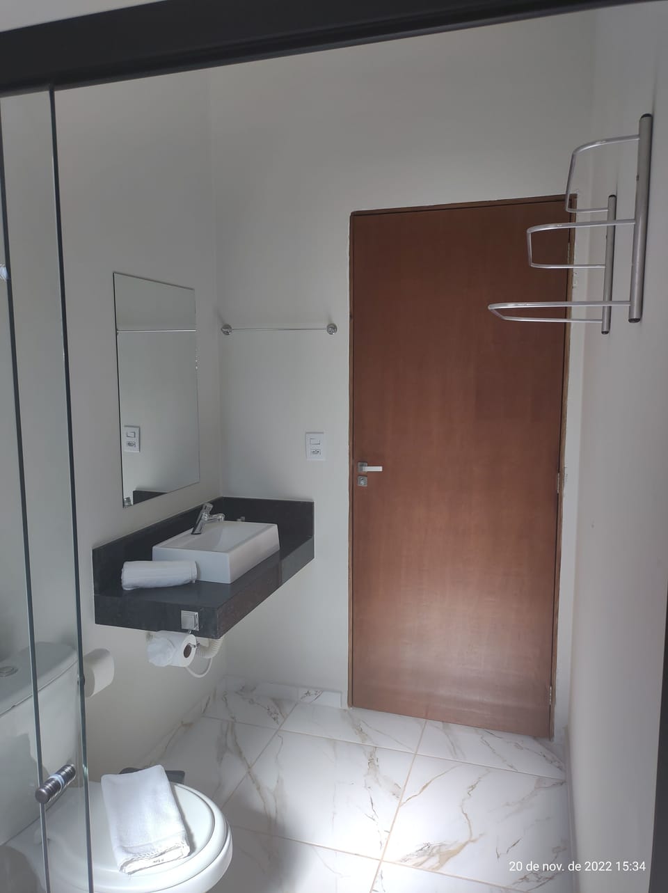 Shower, rainfall showerhead, designer toiletries, towels