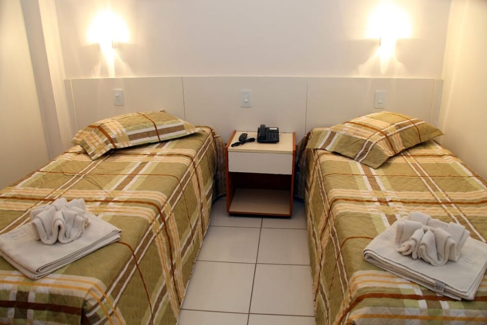 Economy Twin Room | Minibar, free WiFi, bed sheets