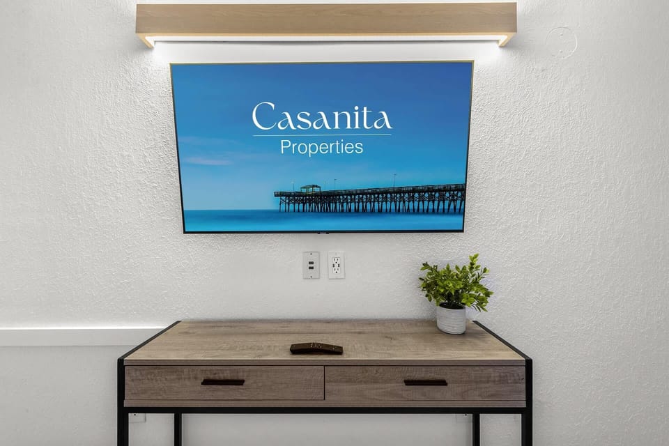 Stream your favorite shows on the large flat-screen Smart TV. 

