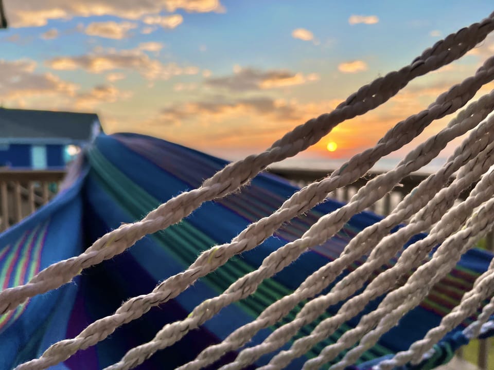 Relax in the hammock to a glorious sunrise!!