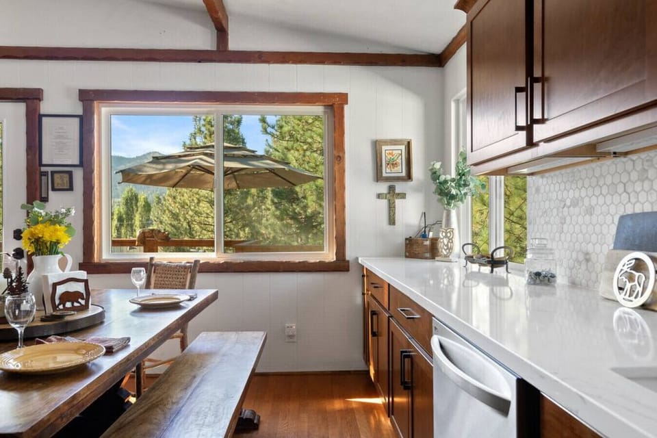 New stove, microwave and dishwasher in the kitchen area.