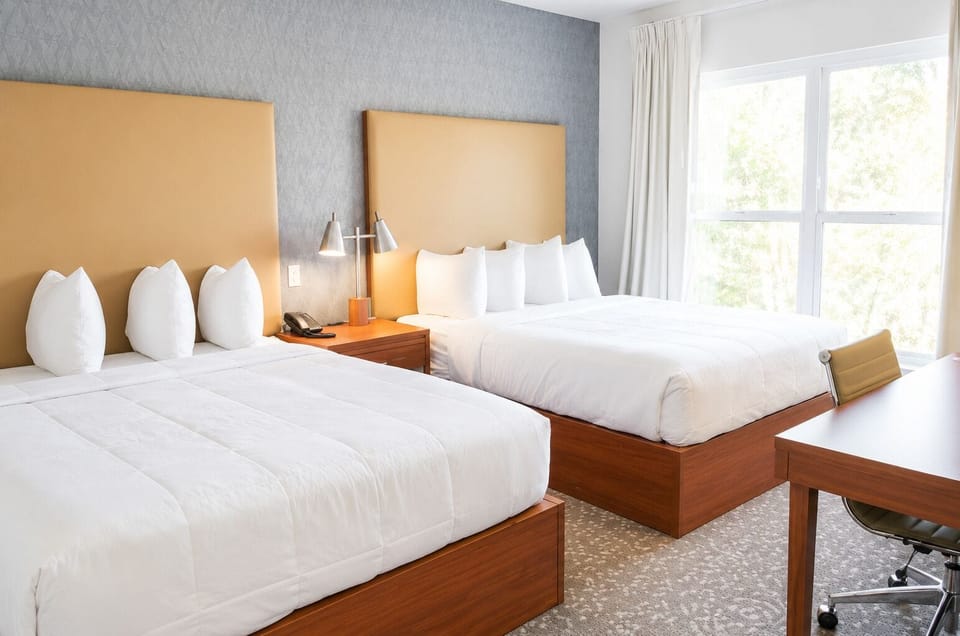 Hypo-allergenic bedding available, in-room safe, desk, laptop workspace