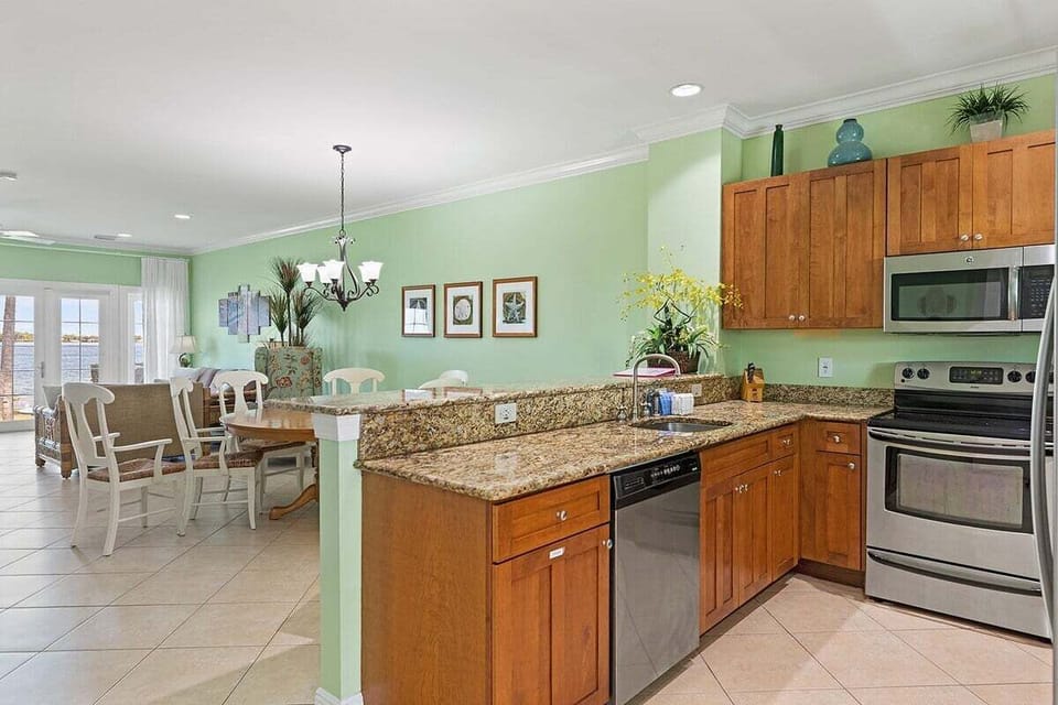 A seamless blend of living, dining, and kitchen spaces, perfect for creating unforgettable memories together.