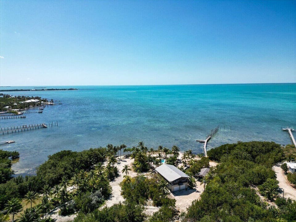 Enjoy panoramic views of turquoise waters stretching to the horizon.