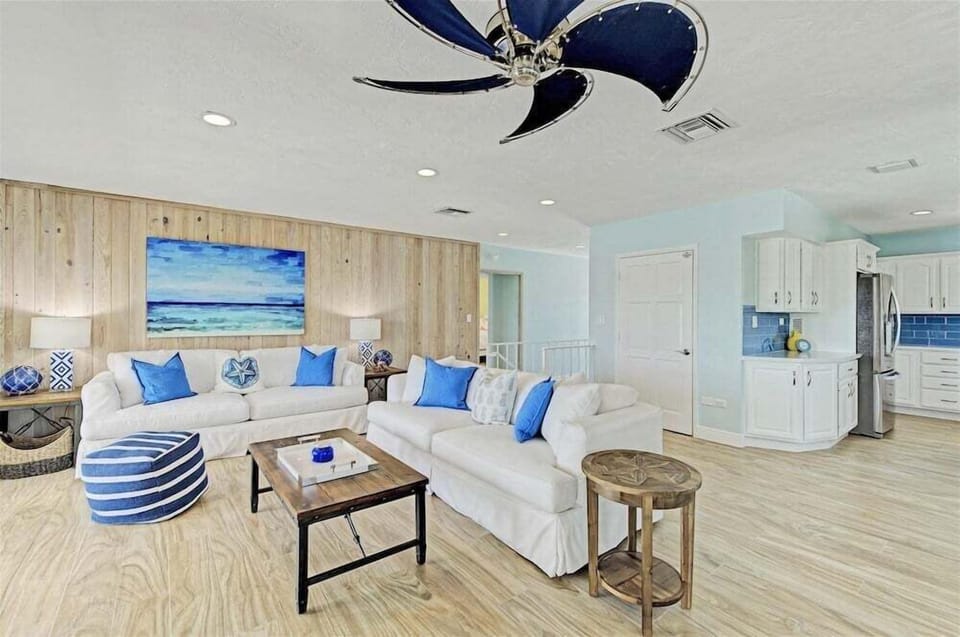 Expansive gathering space perfect for entertaining, relaxing, and enjoying waterfront vacations.
