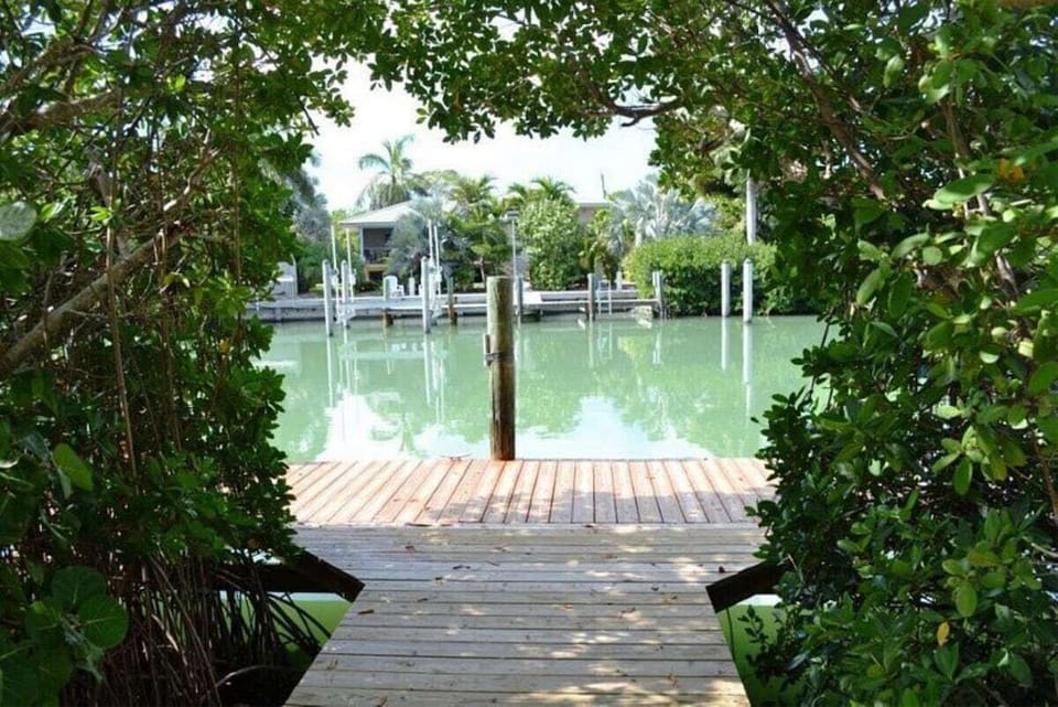 Peaceful canal-front setting with direct access to the water.