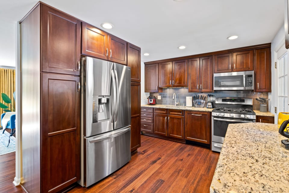 Stunning kitchen with cherry cabinets,granite counters,stainless steel appliance