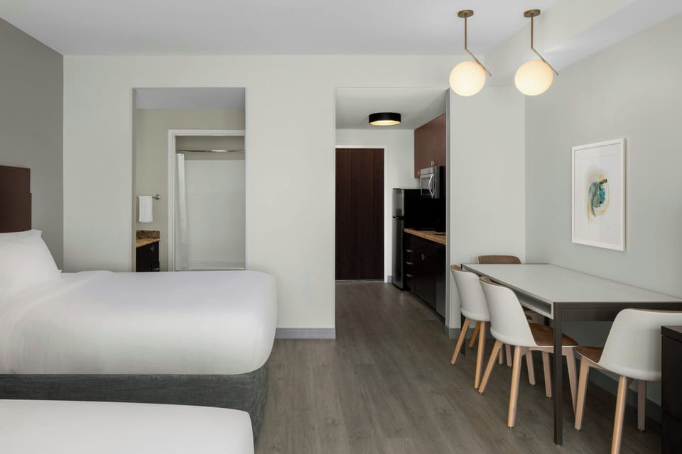 Studio Suite, 2 Queen Beds | In-room safe, desk, laptop workspace, blackout drapes